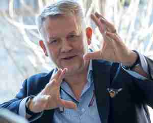 Klaus imping talks digital adoption to the camera.